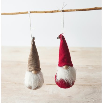 An assortment of hanging felt gonks with added jingling bells and faux fur bearded trims 