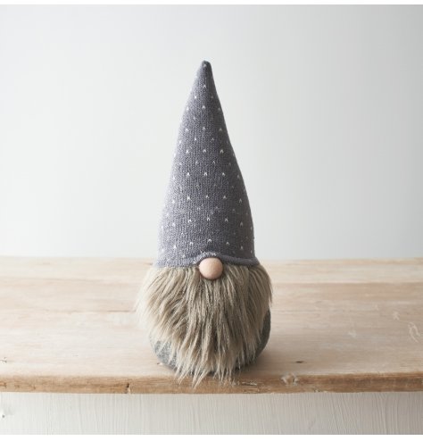 A nordic grey gonk decoration with a long faux fur beard and knitted features.