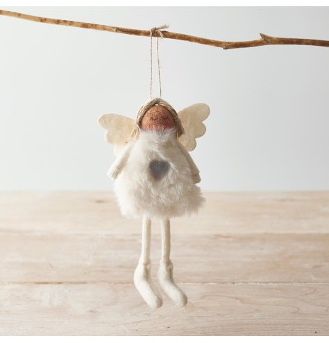 A cute and plush hanging angel decoration with a white toned faux fur body and added grey accents