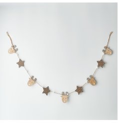 Sure to add a festive and fun touch to your tree or mantle at Christmas, a wooden garland with a reindeer and star look 