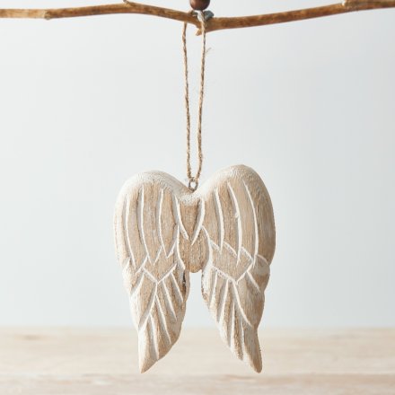  Sure to add an angelic hint to your home space, a pair of chunky wooden angel wings with a distressed natural wood tone
