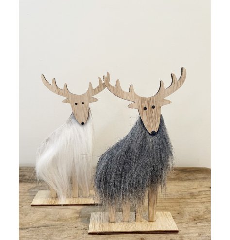A festive mix of wooden based reindeer decorations with glittery touches and faux fur features 