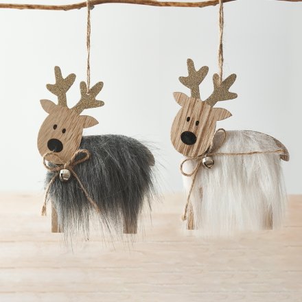 An assortment of natural wood based hanging reindeer with faux fur accents and added glittery touches 