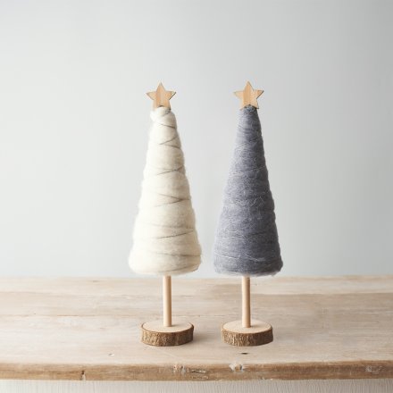 A festive mix of wooden based tree decorations with glittery touches and woollen features 