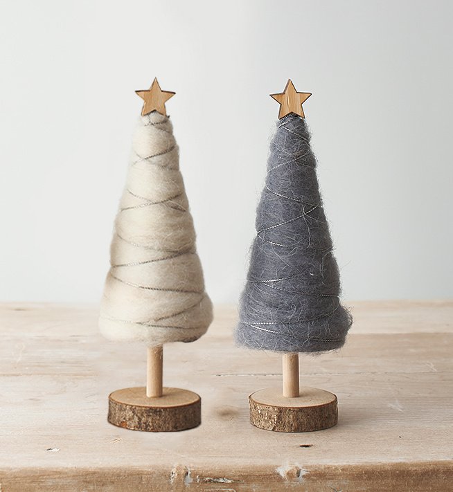  An assortment of natural wood based tree decorations with woollen accents and added festive fun 