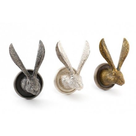 An assortment of metal handles in the shape of Hare Heads 