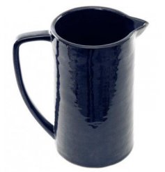 A stunning deep blue hued ceramic jug with a smooth glaze finish, perfect for decorative use 