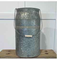A Charming Distressed Detailed Metal Churn