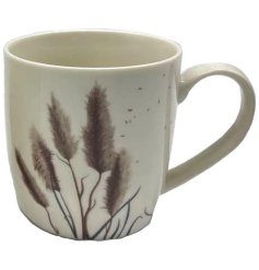 A simplistic ceramic mug with Pampas Stem inspired decal on it 