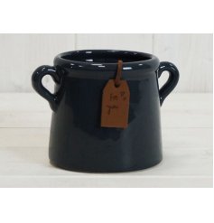  A deep navy hued ceramic vase featuring tapered ear handles and a leatherette tag to finish 