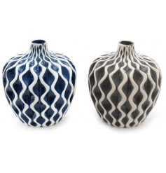 An Assortment of 2 Artistic Serenity Vases