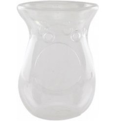 A clear glass tlight holder with a dipped oil / wax burner dish 