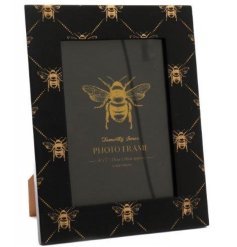 A sleek wooden picture frame with a Black and Gold tone and Bee Print Decal