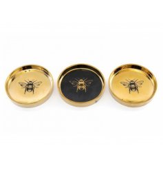  A mix of small circular trinket dishes, each with a Black and Gold tone and Luxe Bee motif 