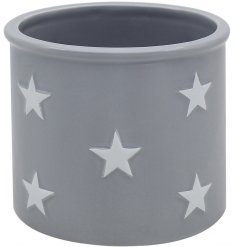 A small grey planter with white star decals