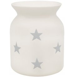 A white ceramic star wax warmer
