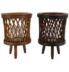 Two lattice patterned lanterns on legs with included glass votive for a candle or T-Light.