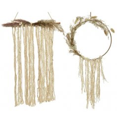 Two intricate and alternate wall decorations, complete with dry grass affixings. 