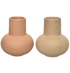 Speckled with gold terracotta vases in an assortment of colours. 
