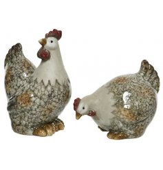 An assortment of 2 charming terracotta rooster ornaments. Each has an attractive crackled glaze.