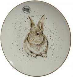 A beautifully illustrated decorative bunny plate. A charming country style item with a speckled finish. 