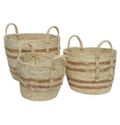A Set of Three Round Stripped Baskets in Cornleaf Fabric