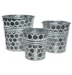 A Set of Three Iron Honey Patterned Planters, 14cm
