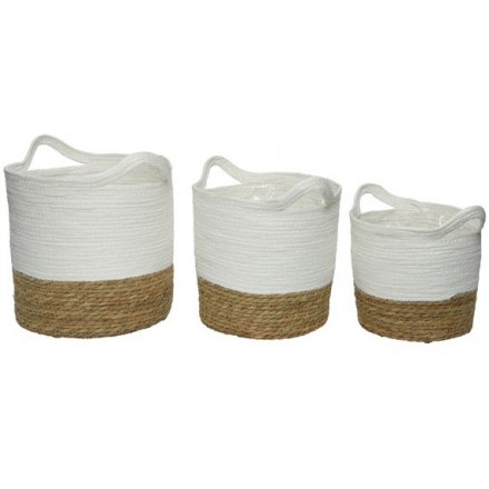 A set of 3 round natural grass baskets.