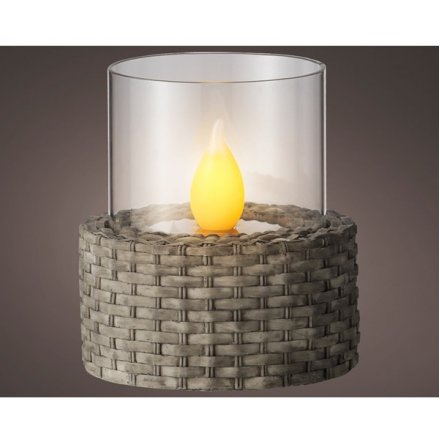 A solar powered flame encased in glass and wrapped in a wicker base. Perfect to make the neighbours envious of your styl