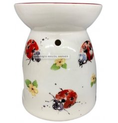 Classic and contemporary ceramic burner with delicate handpainted scenery with flowers and ladybirds