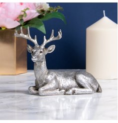Introduce a vintage silver touch to your home space with this beautifully detailed ornamental figure 