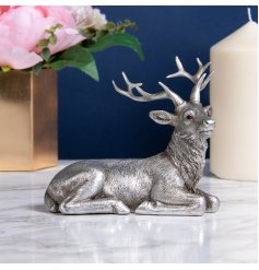 Introduce a vintage silver touch to your home space with this beautifully detailed ornamental figure 
