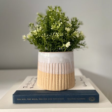 A Glazed White and Natural Planter in Stoneware