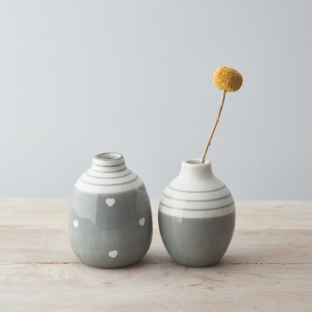 An Assortment of Two Small vases with White and Grey Decal