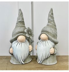 An Assortment of Two Ceramic Grey Gnomes with Flower Detail
