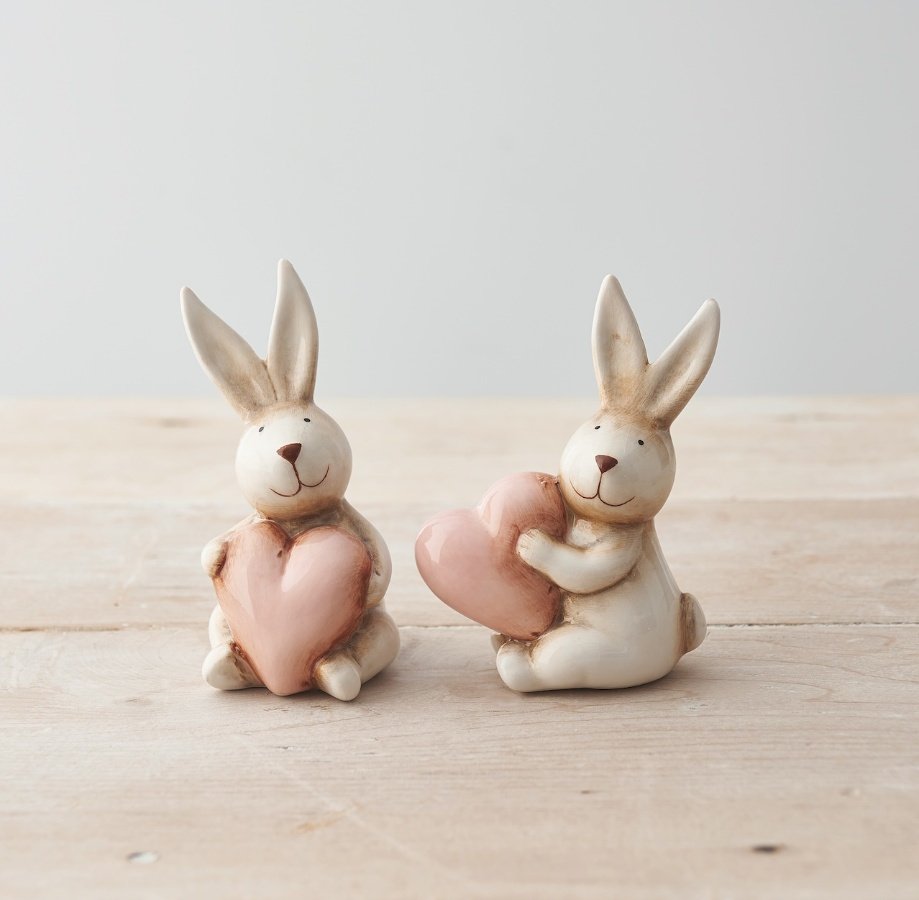 An Adorable Assortment of Two Rabbits Holding Hearts