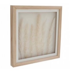 A Boho Styled White Wooden Frame with Pampas