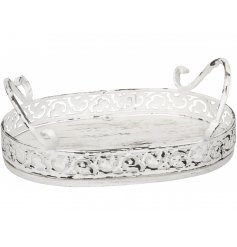 An attractive oval shaped tray with a distressed, white washed finish.