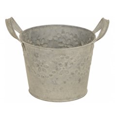 A Distressed Round Iron Planter in Grey