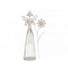 A charming and unique standing fairy ornament with an opening for a candle, flowers or decorative objects.