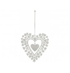 A chic white metal heart shaped hanging decoration with delicate floral details.