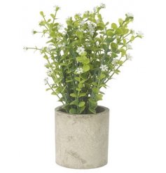An Artificial Plant in a Grey Stone Pot