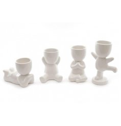 An Assortment of Four White Ceramic Planters in a Fun Design
