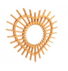 A Heart Shaped Mirror in Rattan