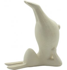 A charming and unique stretching yoga bunny rabbit with a textured white finish.