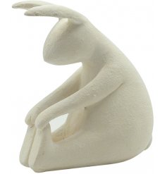 A charming white rabbit decoration in a stretching pose. A chic interior item which will compliment many styles.