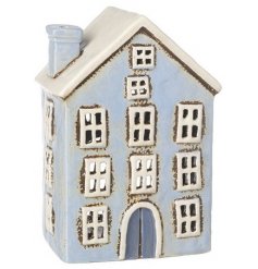 A Ceramic House Lantern with Distressed Finish