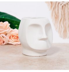 A Quirky Plant Pot in White Glaze