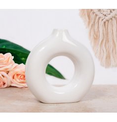 A White Smooth Glazed Vase in Donut Shape