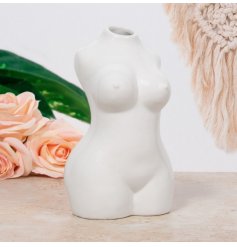 A Sleek and Modern White Vase with Body Detailing 